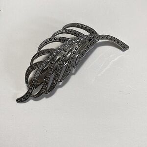 A feather brooch